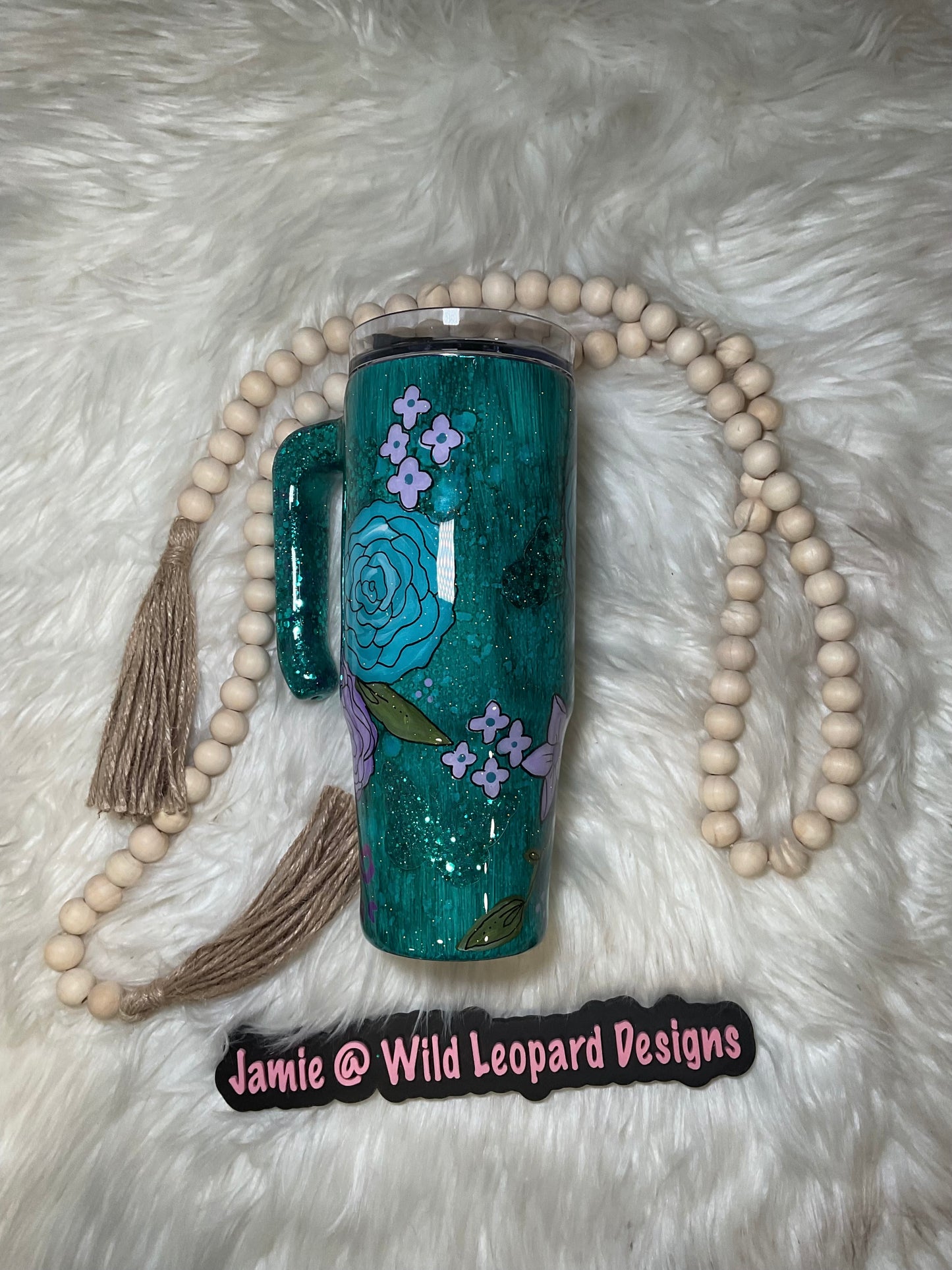 Custom 40 oz Stanley hand painted flowers.