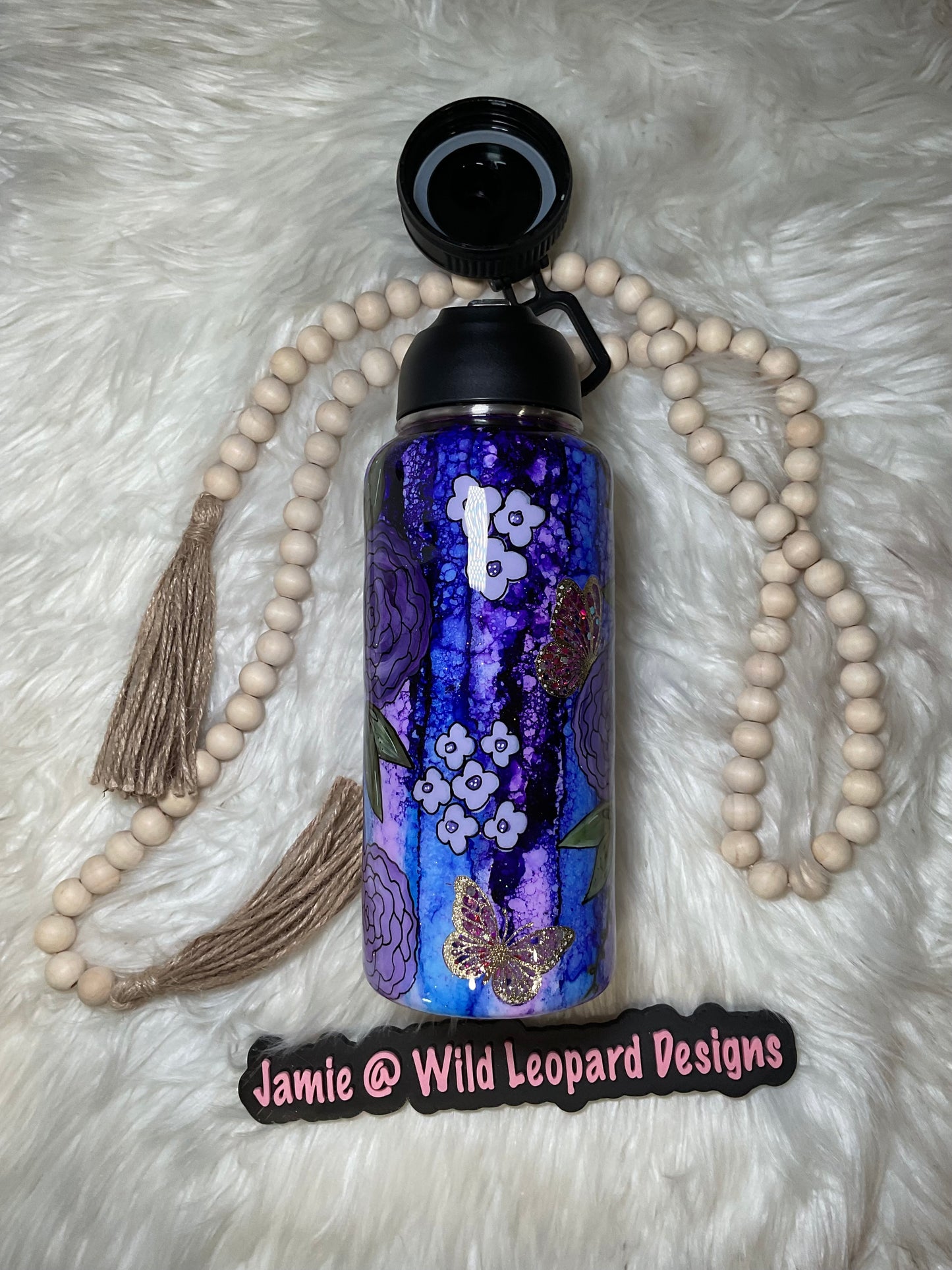 Custom 40 oz Stanley hand painted flowers.