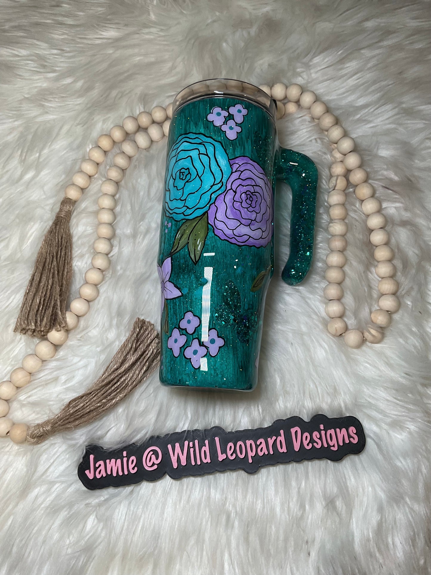 Custom 40 oz Stanley hand painted flowers.