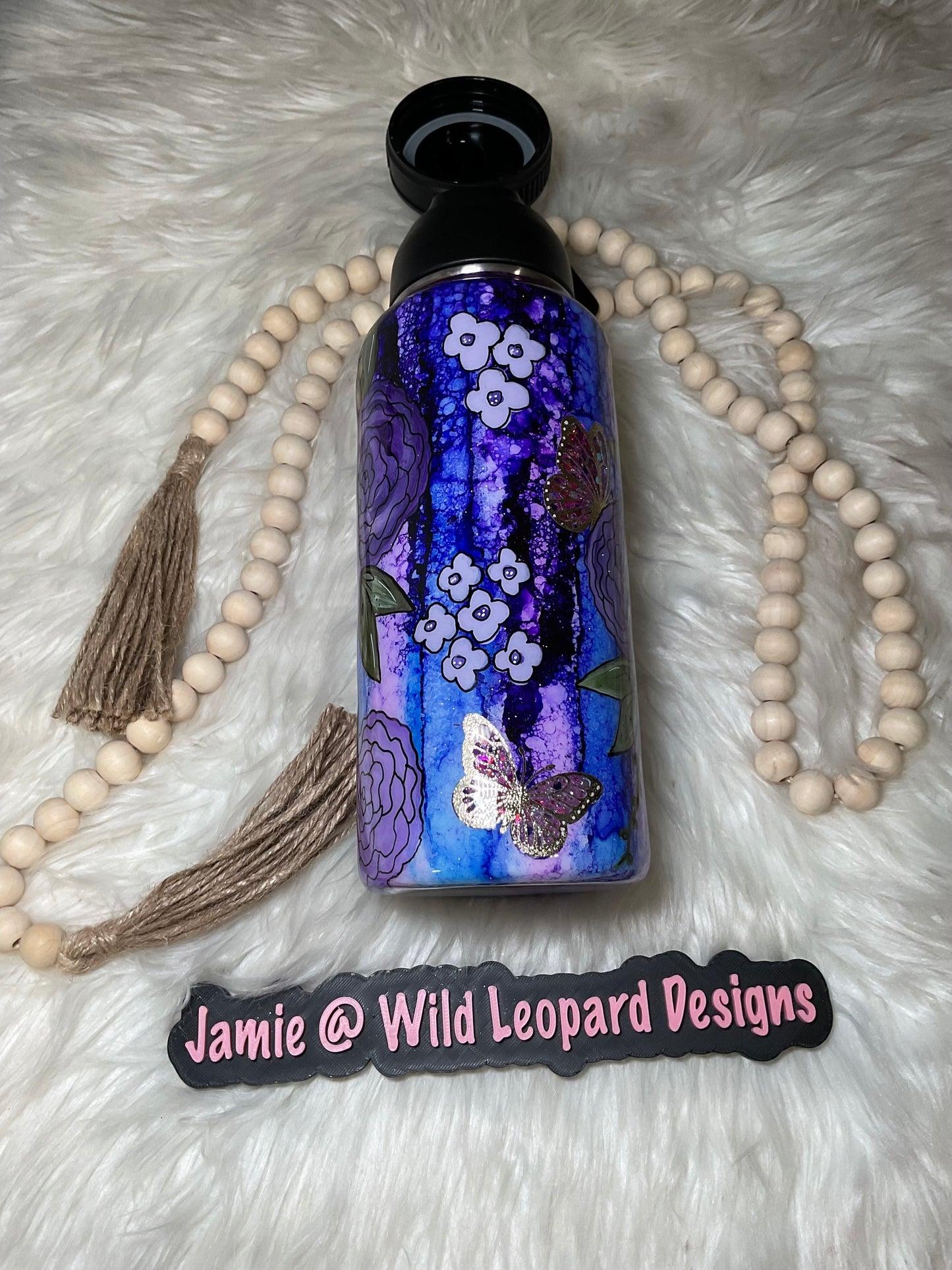 Custom 40 oz Stanley hand painted flowers.