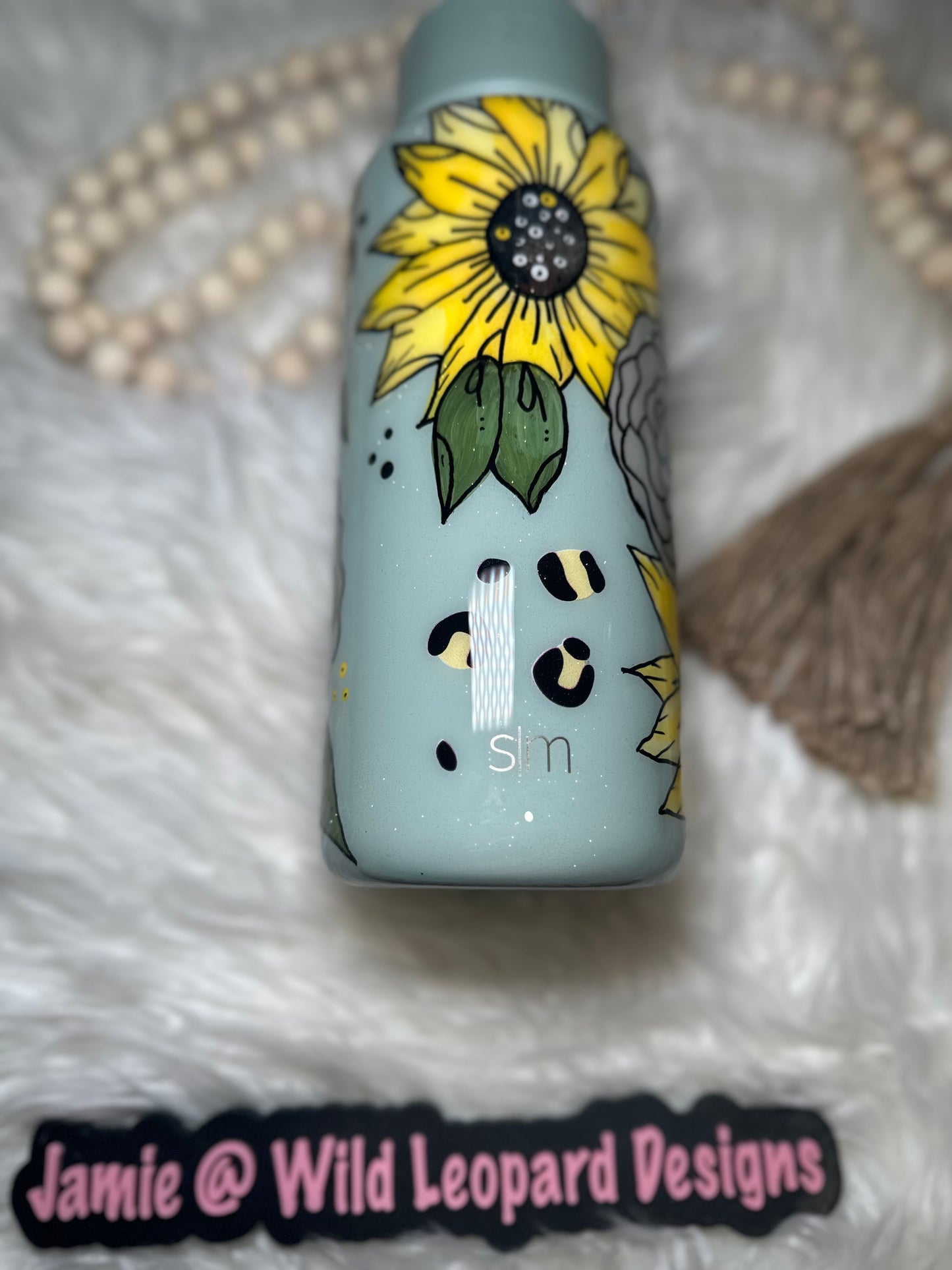 Custom 40 oz Stanley hand painted flowers.