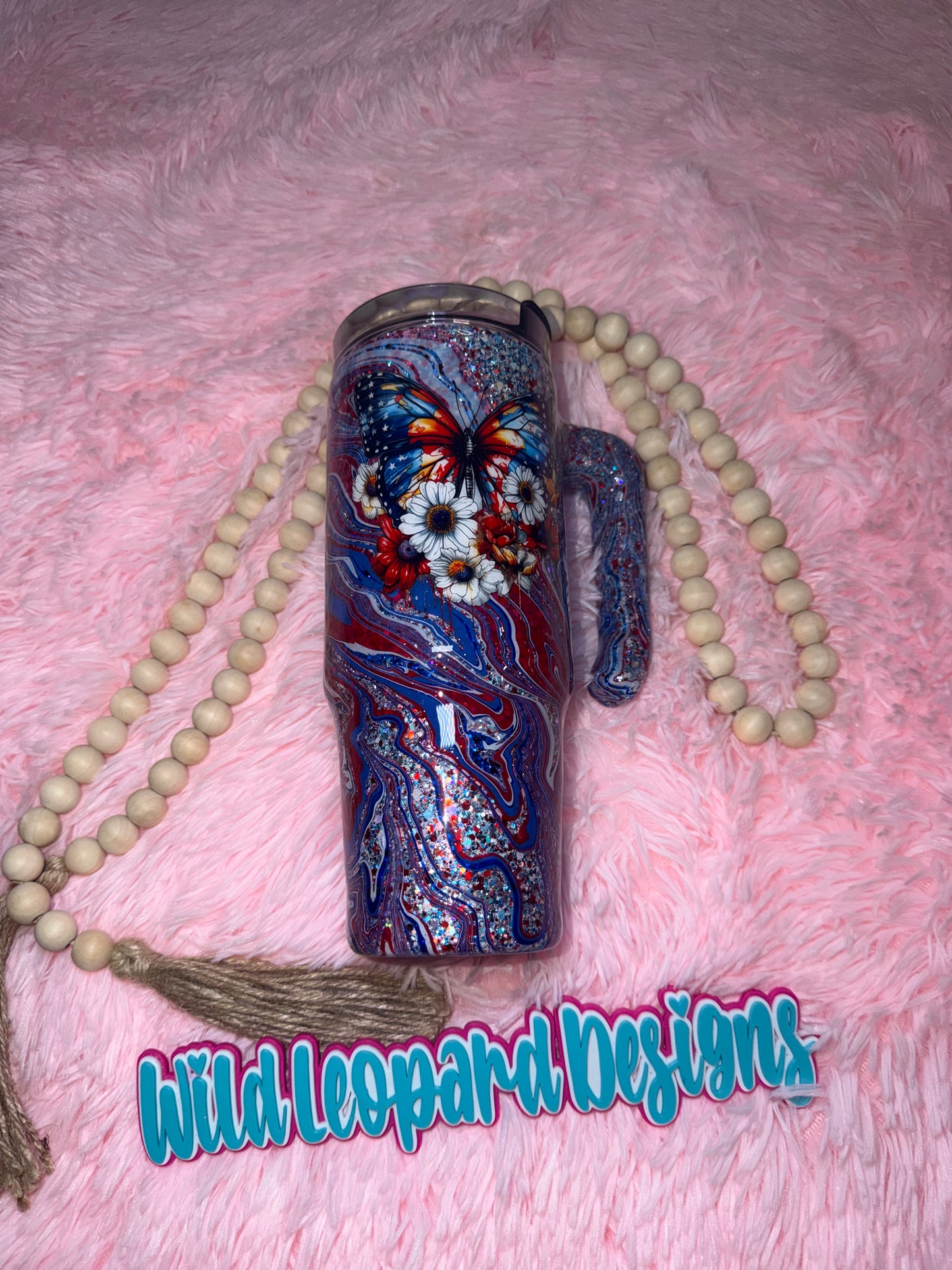 66- 30 oz grippy red white blue butterfly hydro dip