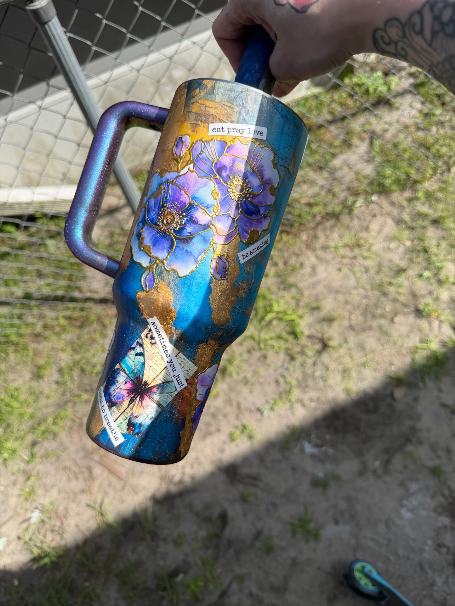 40 Oz Stanley , purple flower with gold outline