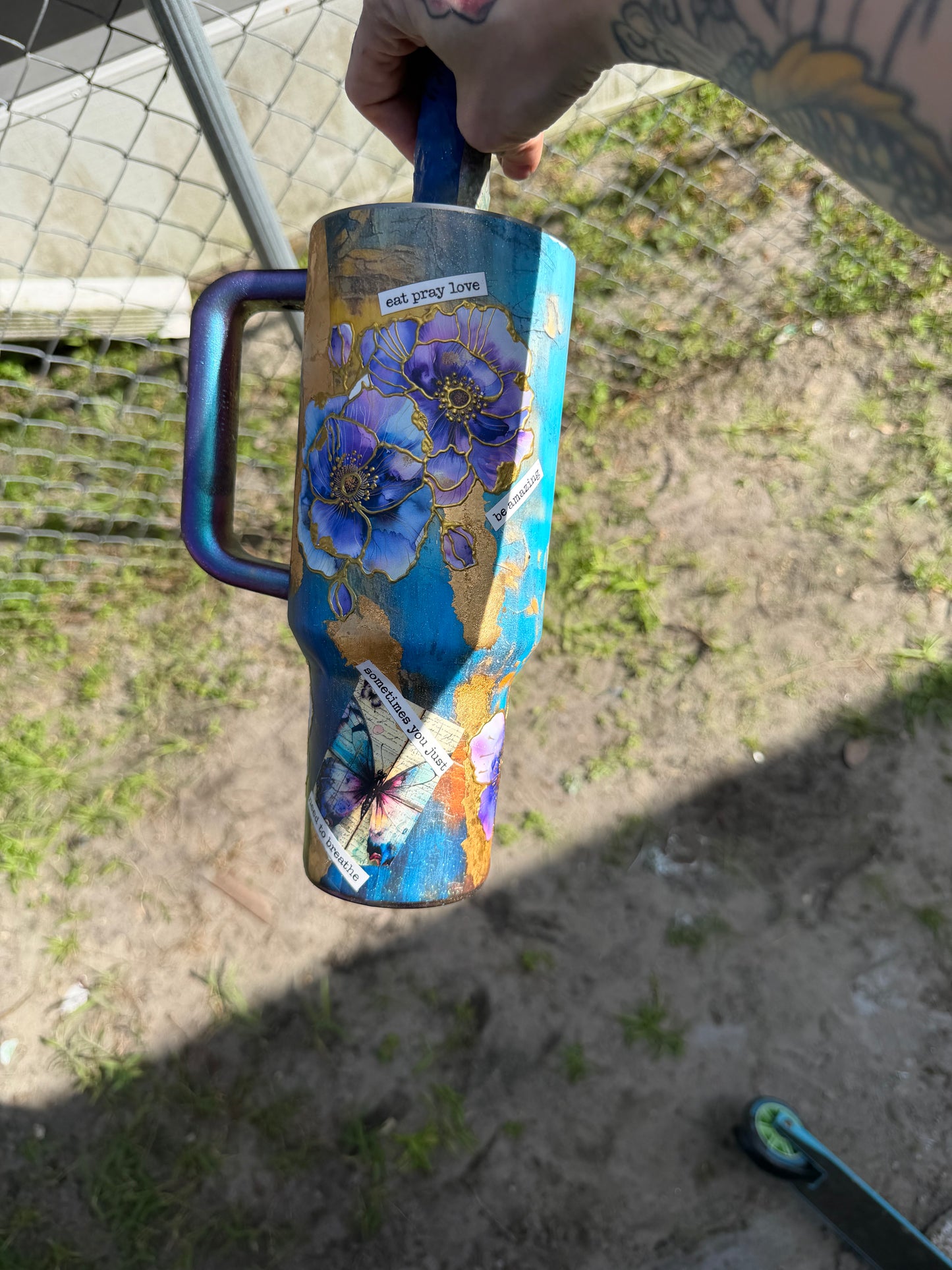 40 Oz Stanley , purple flower with gold outline