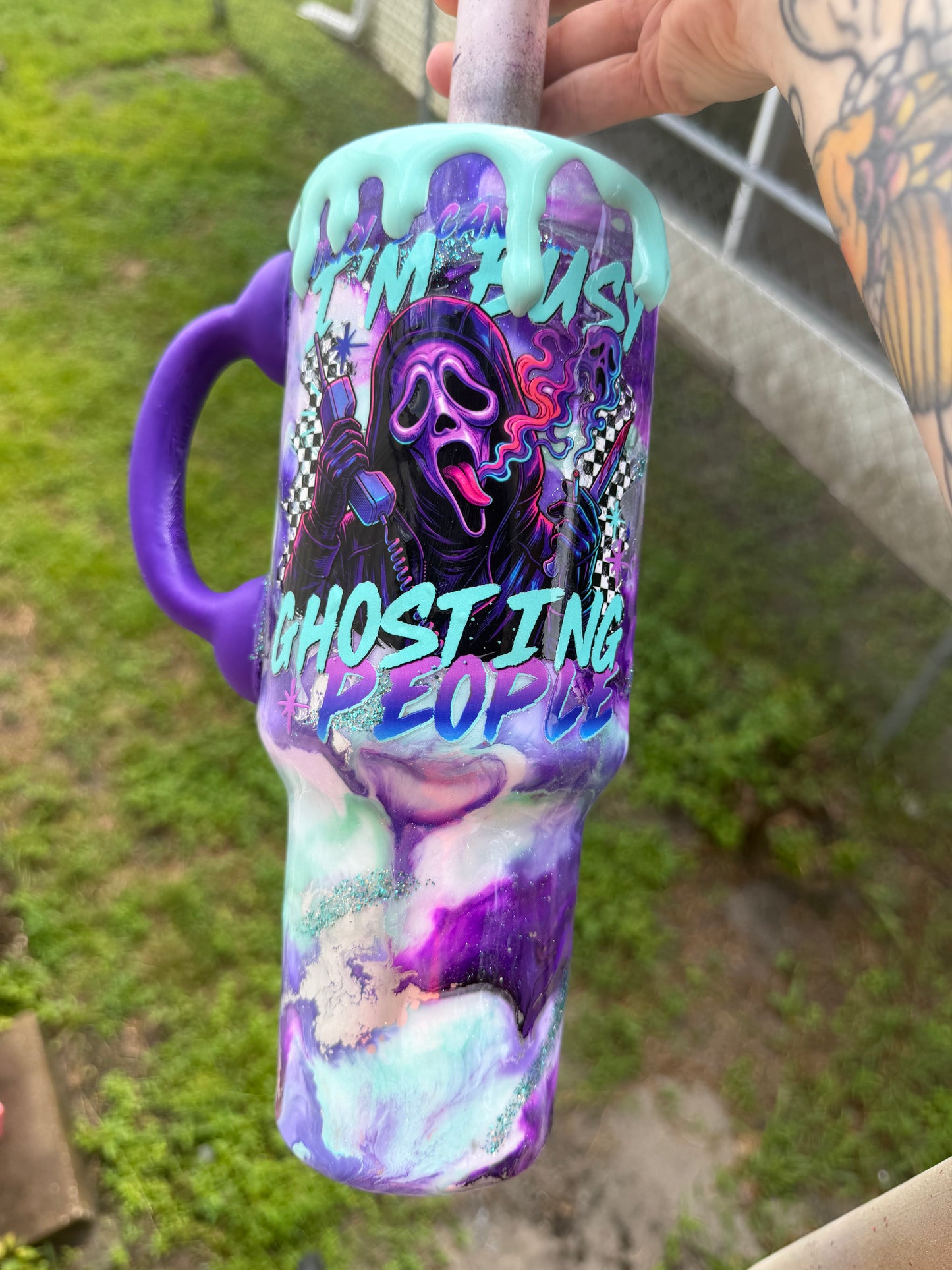 40 oz ghost face with purple phone handle