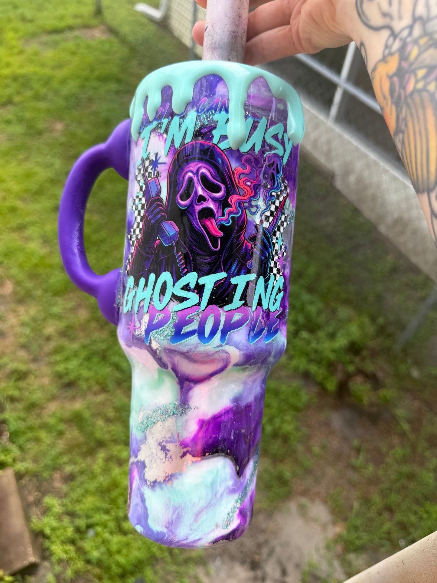 40 oz ghost face with purple phone handle
