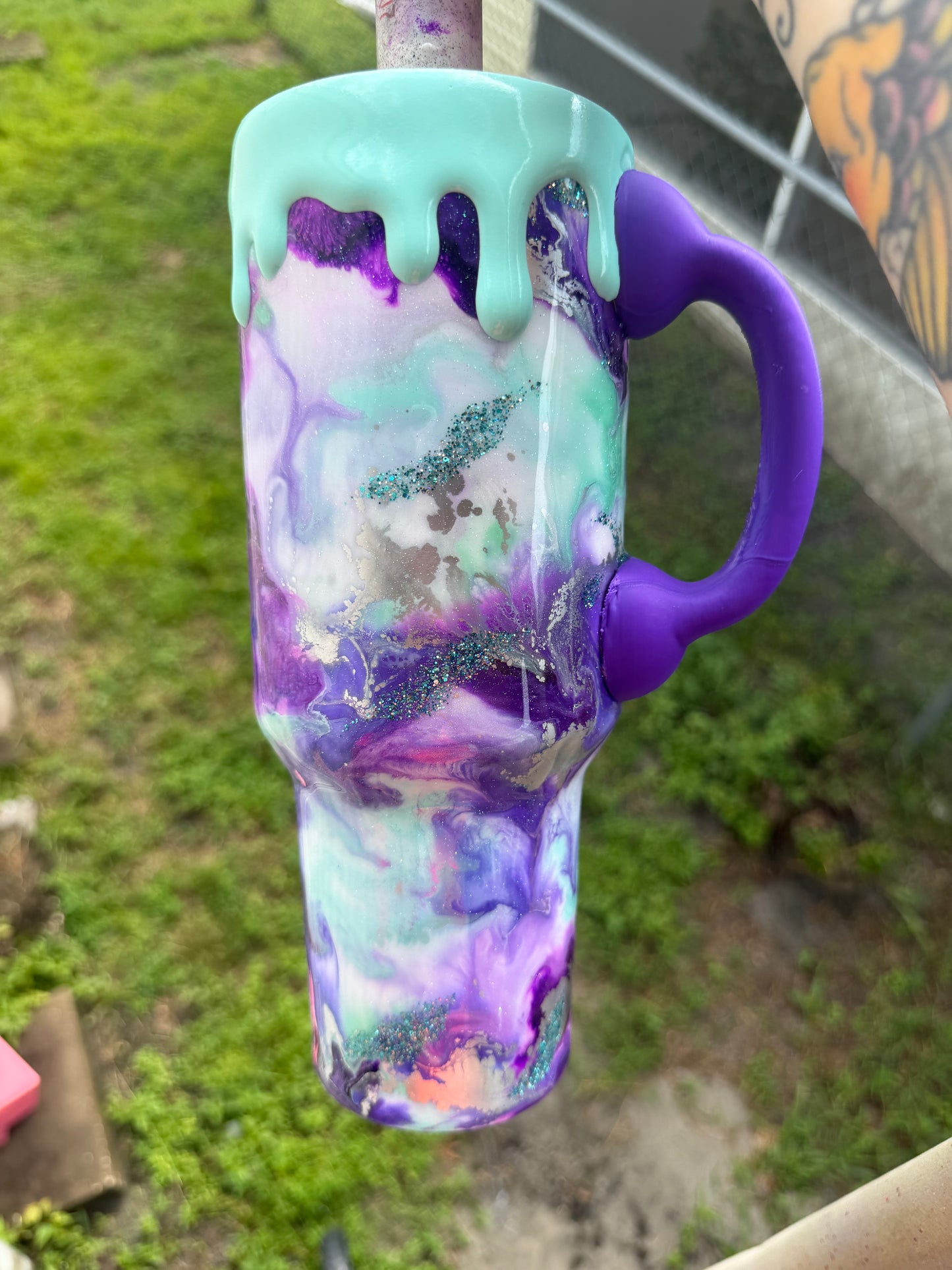 40 oz ghost face with purple phone handle